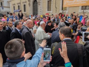 Pope Francis visiting the church of Santa Maria in Trastevere during a visit to the Sant'Egidio community in Rome