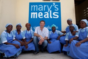 Magnus MacFarlane-Barrow with Mary's Meals Volunteers in Haiti.