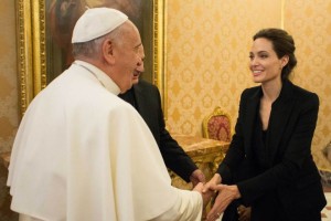 Pope Francis meets director Angelina Jolie following the screening of her film 'Unbroken' at the Vatican. Pic courtesy: time.com 