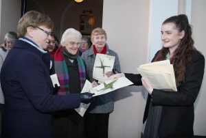 Pic shows a student from Holy Faith School Killester distributing St Brigid's Crosses which they made as part of Catholic Schools Week after the mass. Pic John Mc Elroy.