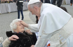 Pope blessing old woman