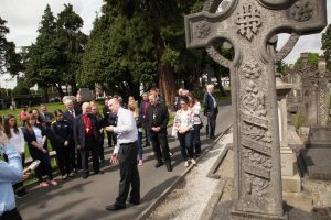 Church of Ireland Archbishop of Armagh Richard Clarke and Roman Catholic Archbishop of Armagh Eamon Martin and pilgrims getting a guided tour of Glasnevin Cemetery by historian Conor Dodd as they set out on the Somme Centenary Pilgrimage. Pic John Mc Elroy.