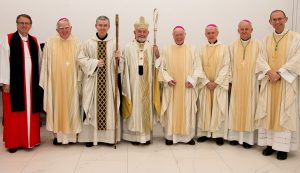 Dr Kenneth Kearon (CofI)and six bishops with Abbot Brendan Coffey